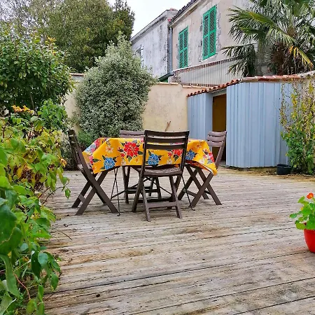 Maison En *