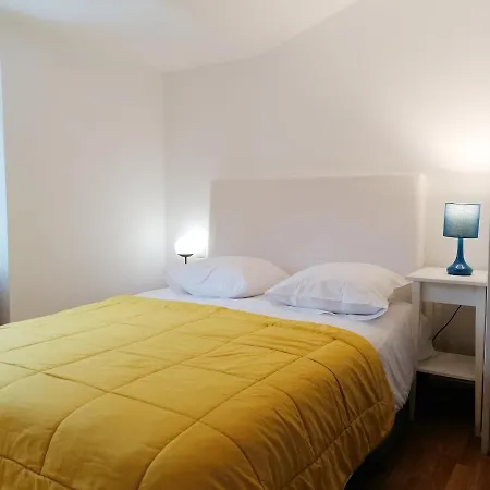 Maison En *