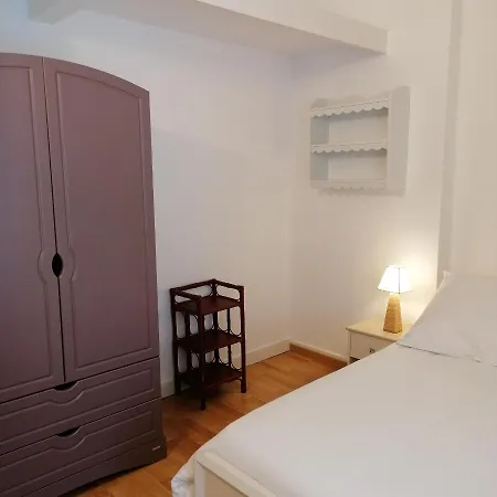 Maison En *